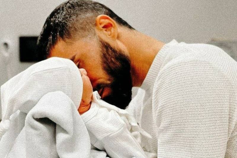 عکس مهرداد محمدی و فرزندش
